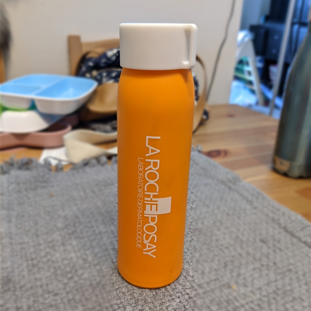 New La Roche-Posay Glass Water Bottle In Orange Sleeve